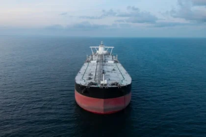 Oil tanker approaching the Strait of Hormuz, a critical global energy chokepoint.