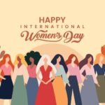 Women celebrating International Women’s Day with banners and flowers